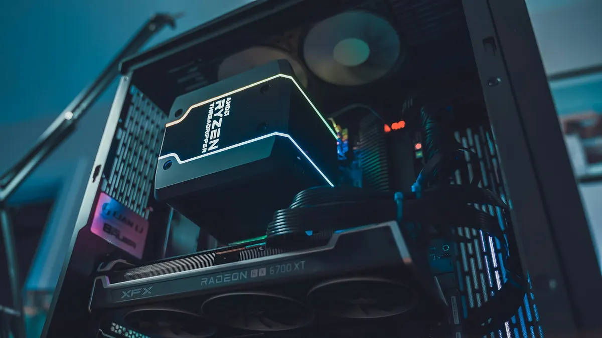The inside of a computer case with the CPU cooler and graphics card installed